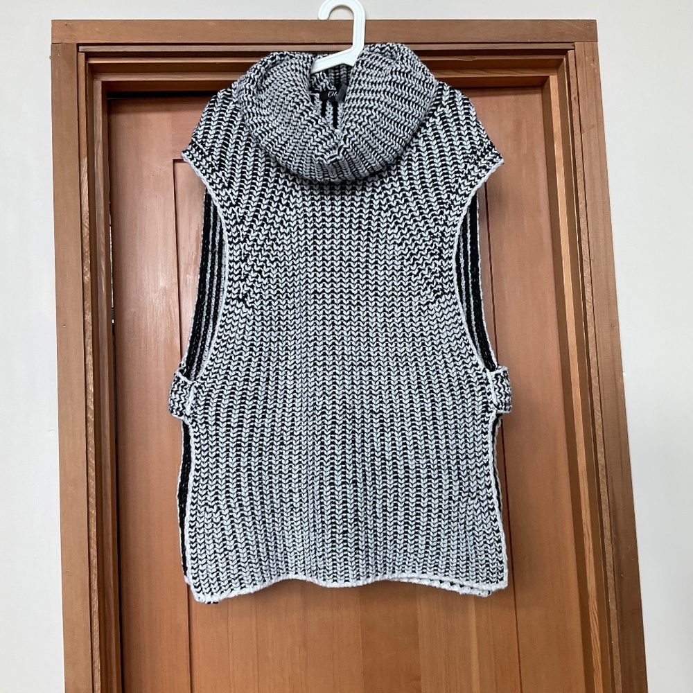 Oversize knit vest in black and white by ORLY. Size large